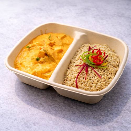 Red fish curry with vegetables served with quinoa